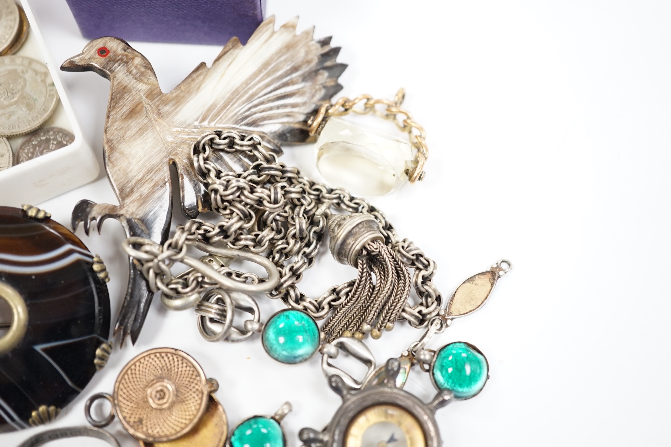 A small quantity of assorted jewellery including a late Victorian silver name brooch 'Polly', 42mm, a late Victorian 9ct gold and gem set horseshoe ring (stones missing), a late Victorian silver and carnelian set signet